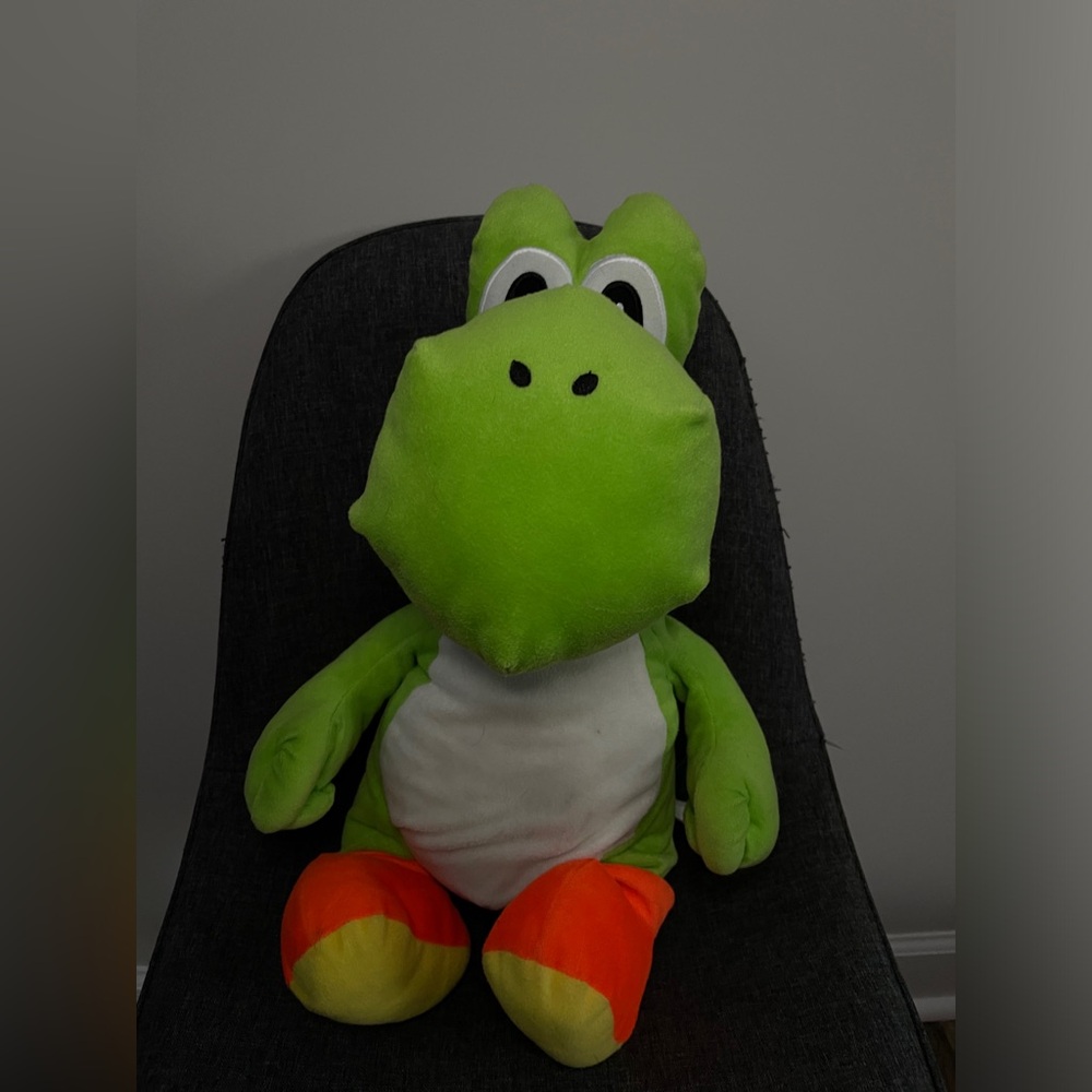 Giant yoshi pillow with hidden compartment